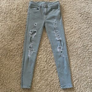 Green American Eagle ripped jeans